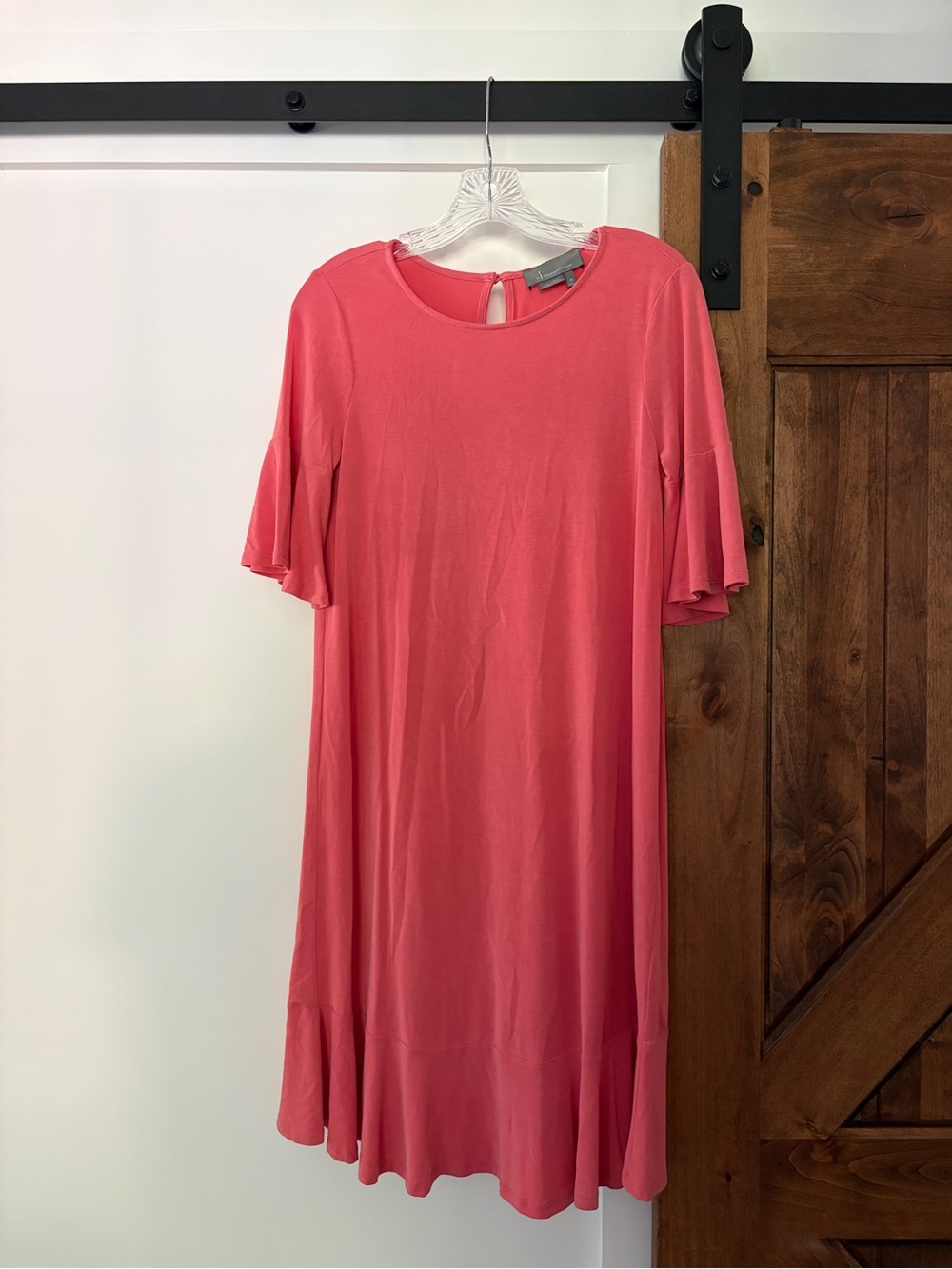 anthropologie coral pink swing dress with ruffle sleeves and hem